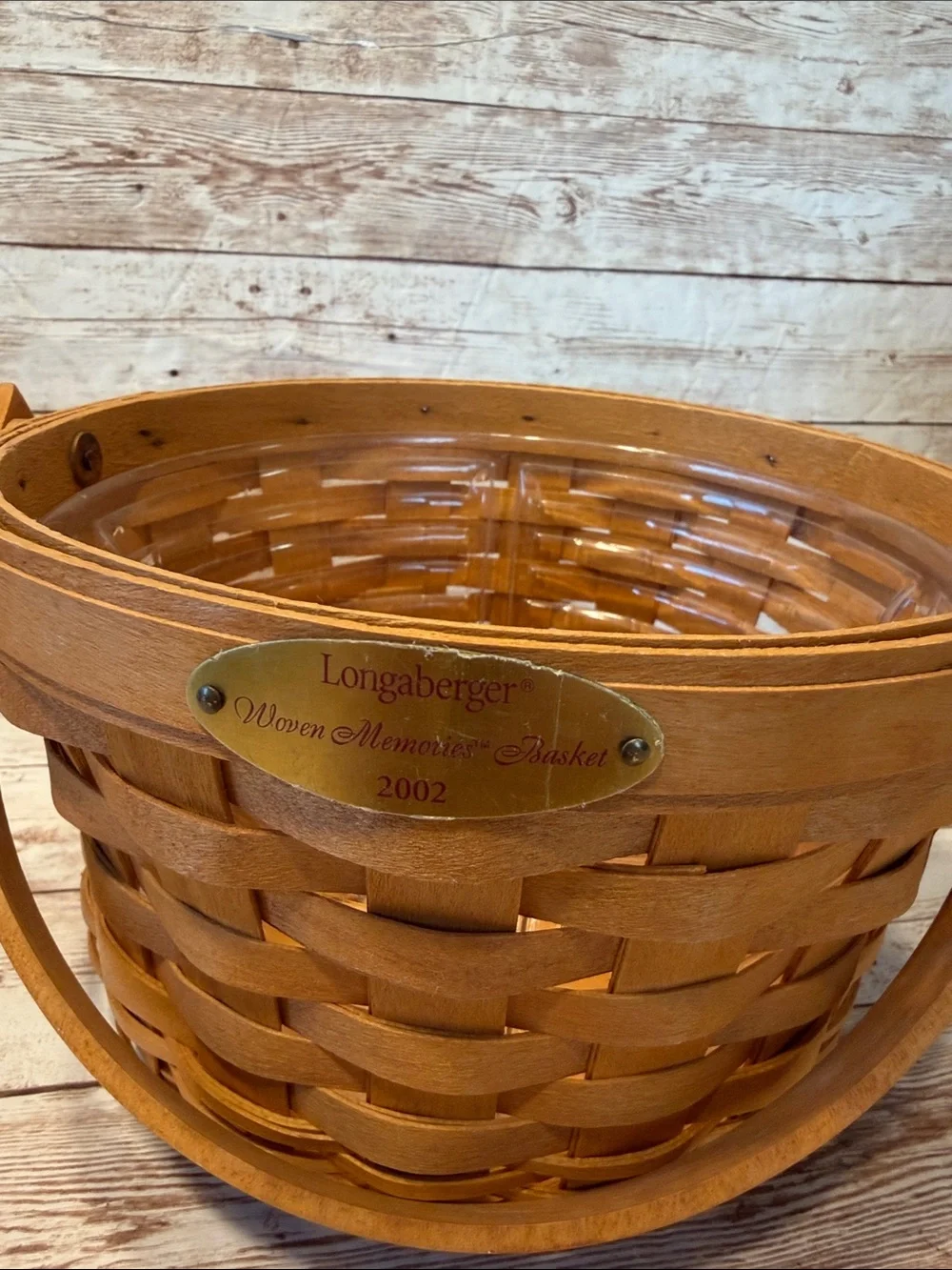 Longaberger woven basket in warm brown with handle